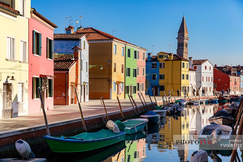Colorful houses in Burano with canal and moored boats, Venice, Venetian lagoon, Veneto, Italy, Europe