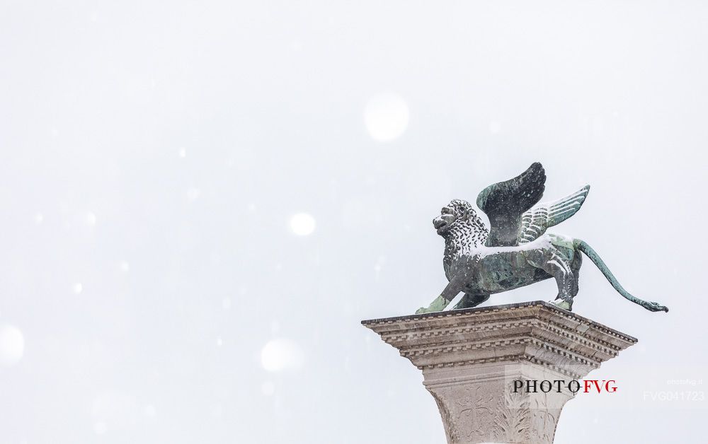 Lion of St Mark covered by snow, Venice, Veneto, Italy, Europe