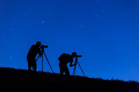 Photographers under the starry sky