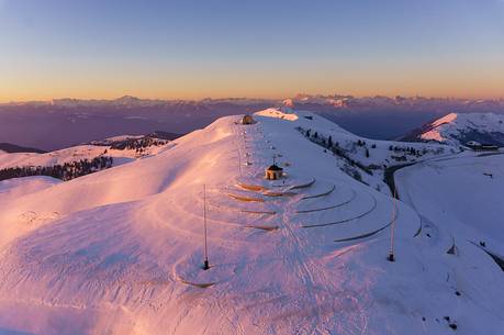 Ossuary to the fallen of Cima Grappa in the depths of winter at sunset