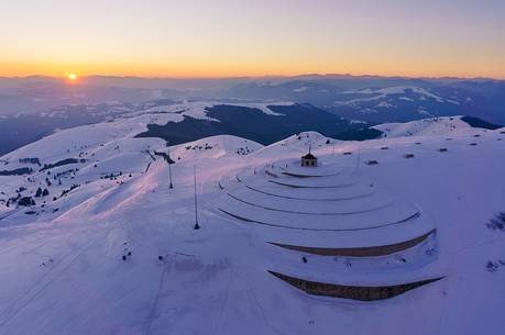 Ossuary to the fallen of Cima Grappa in the depths of winter at sunset