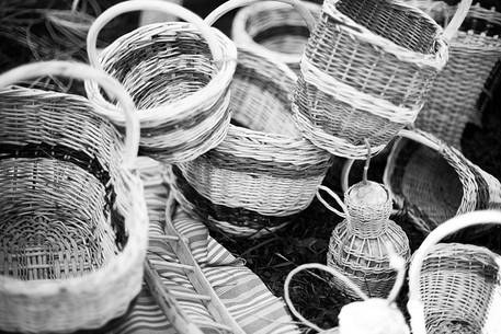 Artisan creates wicker baskets