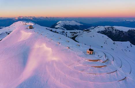 Aerial view of the ossuary to the fallen of Cima Grappa in the depths of winter at sunset Aerial view of the ossuary to the fallen of Cima Grappa in the depths of winter at sunset