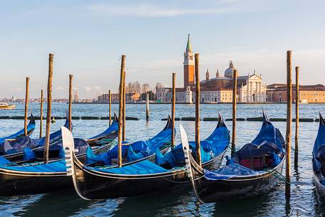 Gondolas at sunset, in the background the Church of San Giorgio Maggiore