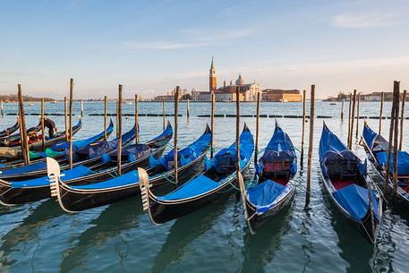 Gondolas at sunset, in the background the Church of San Giorgio Maggiore