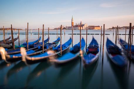 Gondolas at sunset, in the background the Church of San Giorgio Maggiore