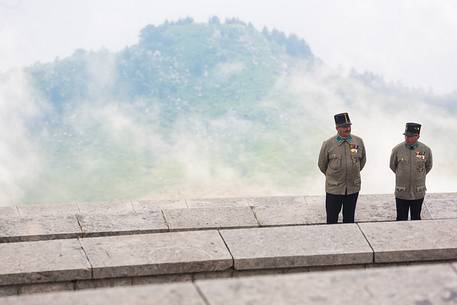 Troops in uniform during historical memorial to the fallen of Cima Grappa