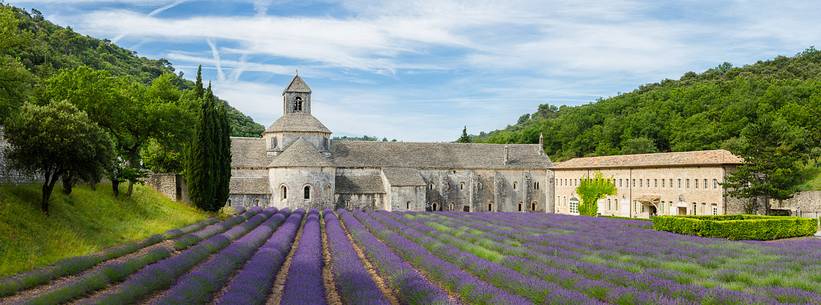 The ancient abbey of Sénanque, located a few kilometers from the picturesque village of Gordes The ancient abbey of Sénanque, located a few kilometers from the picturesque village of Gordes