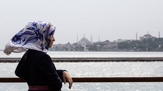 Woman looks Bosphorus strait