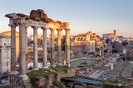 Sunset light on the Roman Forums, the Colosseum in the background Sunset light on the Roman Forums, the Colosseum in the background