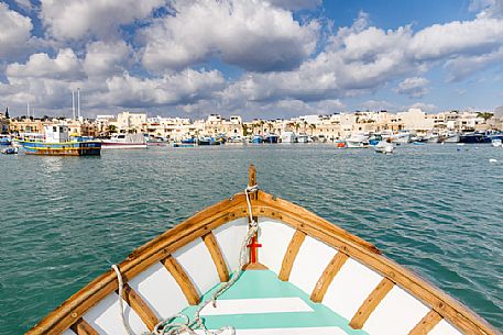 The historic city of Marsaxlokk on the island of Malta from Iuzzu, the typical colorful fishing boats. The historic city of Marsaxlokk on the island of Malta from Iuzzu, the typical colorful fishing boats.