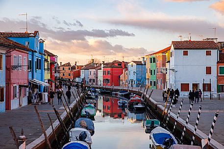 Colorful houses in Burano with canal and moored boast, Venice, Venetian lagoon, Veneto, Italy, Europe Colorful houses in Burano with canal and moored boast, Venice, Venetian lagoon, Veneto, Italy, Europe