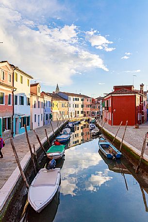 Colorful houses in Burano with canal and moored boats, Venice, Venetian lagoon, Veneto, Italy, Europe