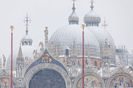 Domed roof of the Basilica San Marco church or St Mark basilica in Piazza San Marco or St Mark square in a snowy day, Venice, Italy Domed roof of the Basilica San Marco church or St Mark basilica in Piazza San Marco or St Mark square in a snowy day, Venice, Italy
