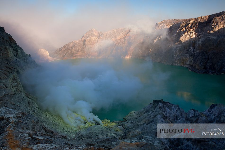 Sunrise at Ijen Crater, one of the most impressive place on Java Island, Indonesia.