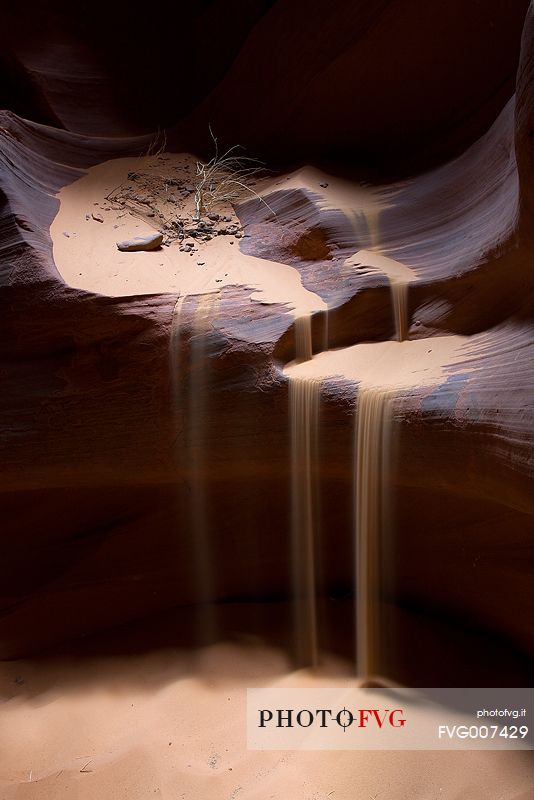 Sand falls in the Upper Antelope Canyon, near Page, Arizona.