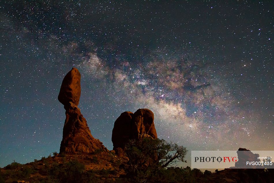 The hanging rock under the milky way, Arches National Park, Utah.