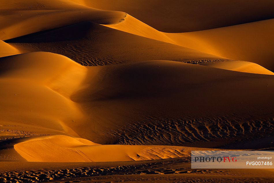 Shapes and colors at sunrise from the desert area of the Great Sand Dunes National Park, Colorado.