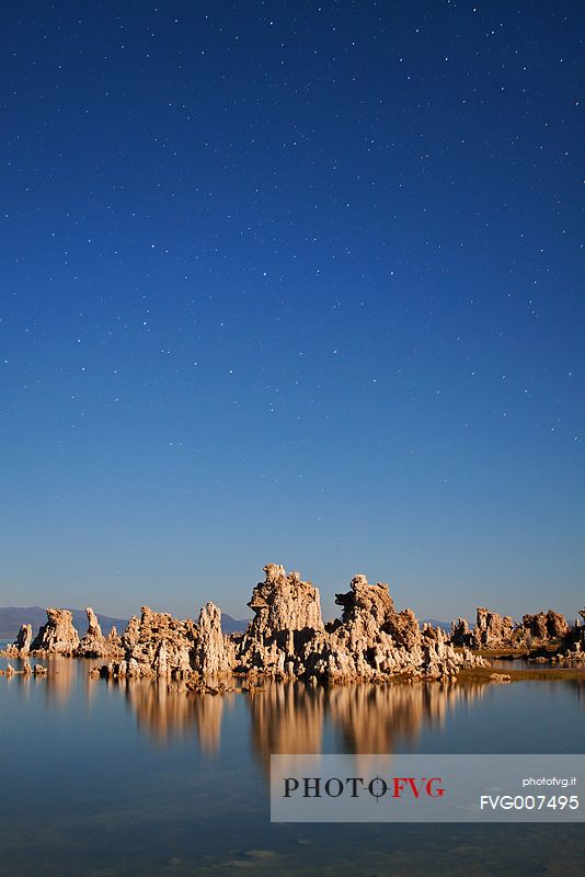 Starry night over some rock formations at Mono Lake, California