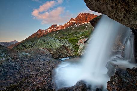 Amazing hidden waterfall in Stelvio National Park.
