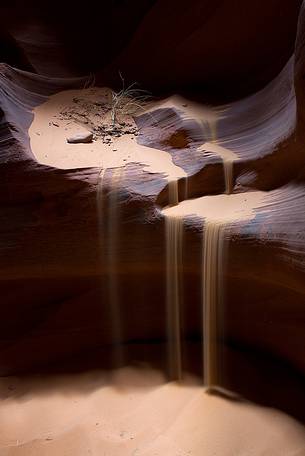 Sand falls in the Upper Antelope Canyon, near Page, Arizona.