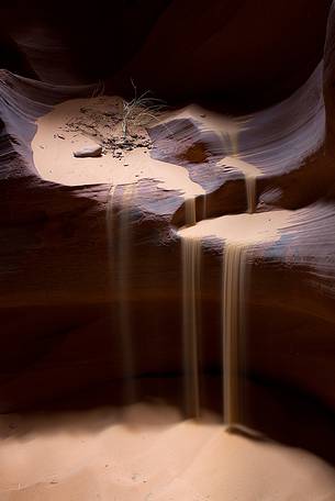 Sand falls in the Upper Antelope Canyon, near Page, Arizona. Sand falls in the Upper Antelope Canyon, near Page, Arizona.