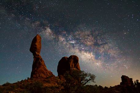 The hanging rock under the milky way, Arches National Park, Utah.