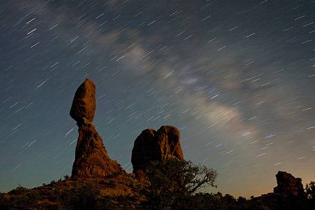 The hanging rock under the milky way, Arches National Park, Utah.