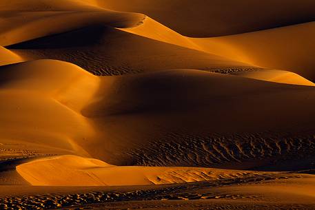 Shapes and colors at sunrise from the desert area of the Great Sand Dunes National Park, Colorado.