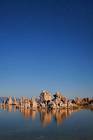 Starry night over some rock formations at Mono Lake, California