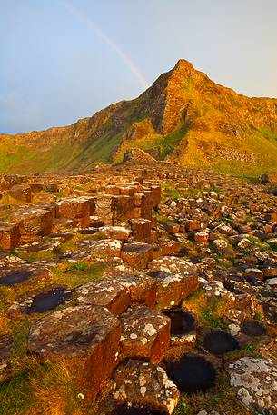 Amazing rainbow at sunset over the Giant's Causeway, Northern Ireland