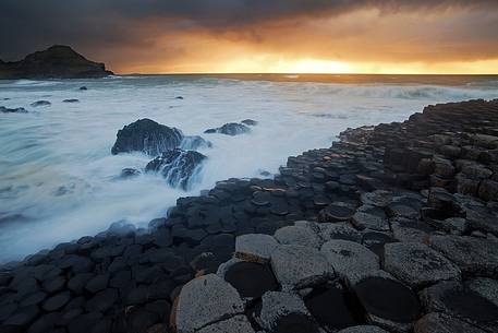 Amazing sunset and the basaltic rocks of the Giant's Causeway, Northern Ireland