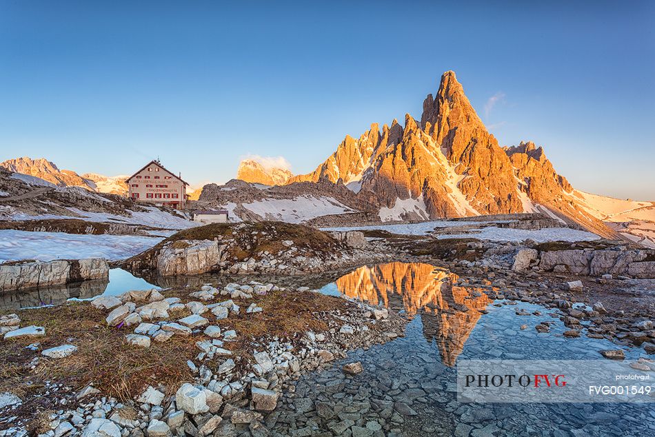 summer sunset in Tre Cime di Lavaredo ,mount Paterno and refuge Lavaredo