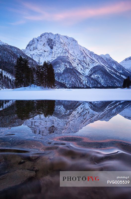 Julian Alps, winter view to the Lake Predil, natural alpine lake