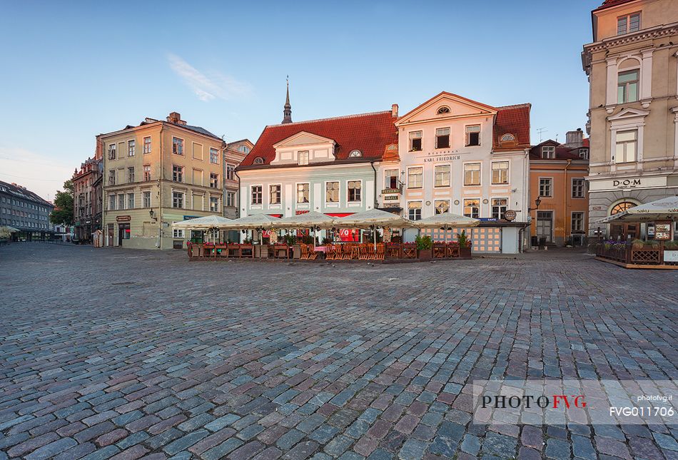 sunrise on Tallinn old town, summer restaurants in Town Hall Square