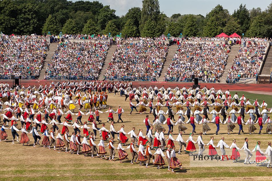 This is the story of time manifesting itself in our ancestors heritage and us shaping our time through our own touches, contacts, caresses and impacts.
Song and dance celebrations are an old and very important tradition for Estonia and Estonians (the first song celebration took place in 1869 and the first dance celebration in 1934) and these celebrations are nowadays held every five years. In 2003 our tradition of song and dance celebrations was entered to UNESCOs List of Intangible Cultural Heritage.