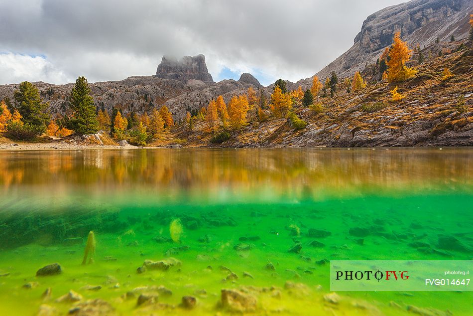 Autumn in lake Limides (or Limedes), and in the background Averau mountains