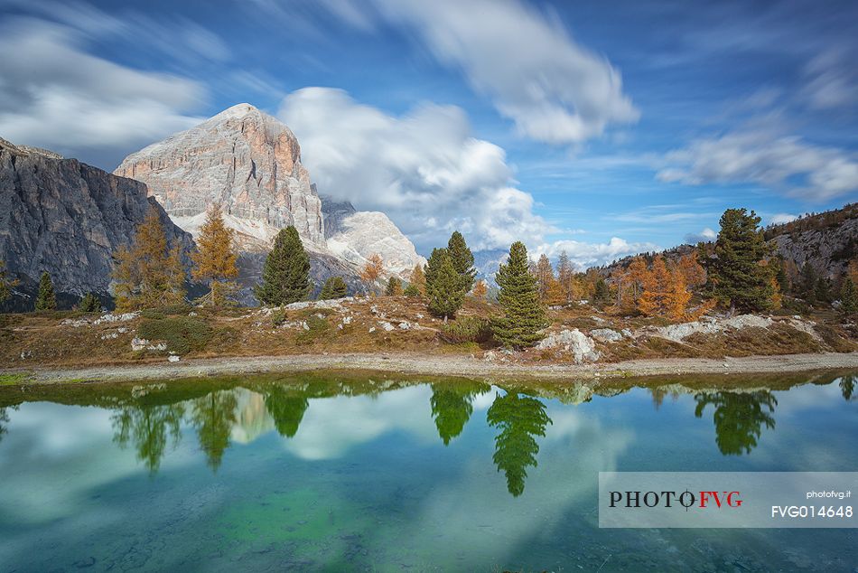 Autumn in lake Limides (or Limedes), and in the background Tofana mountains (Tofana di Rozes)