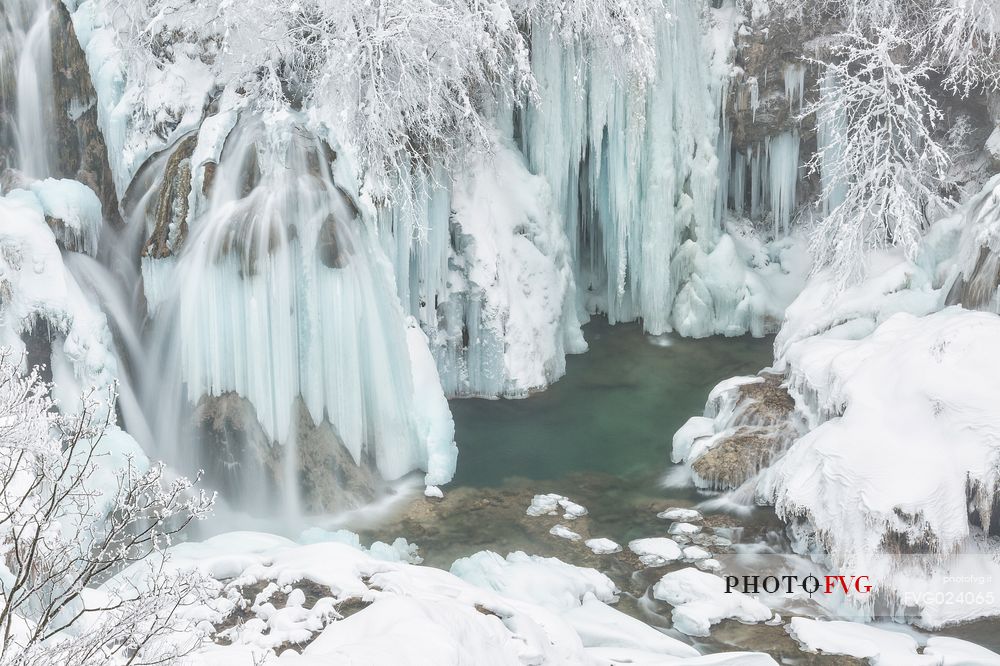 Frozen lakes and waterfalls in Plitvice Lakes National Park, Croatia