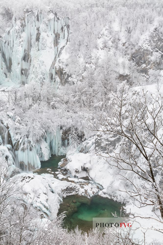 Frozen lakes and waterfalls in Plitvice Lakes National Park, Croatia