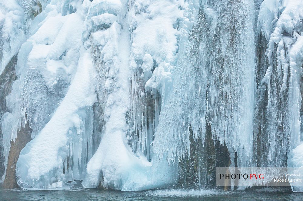 Frozen lakes and waterfalls in Plitvice Lakes National Park, Croatia