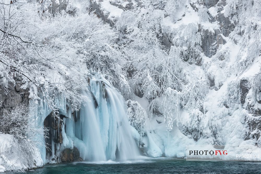 Frozen lakes and waterfalls in Plitvice Lakes National Park, Croatia