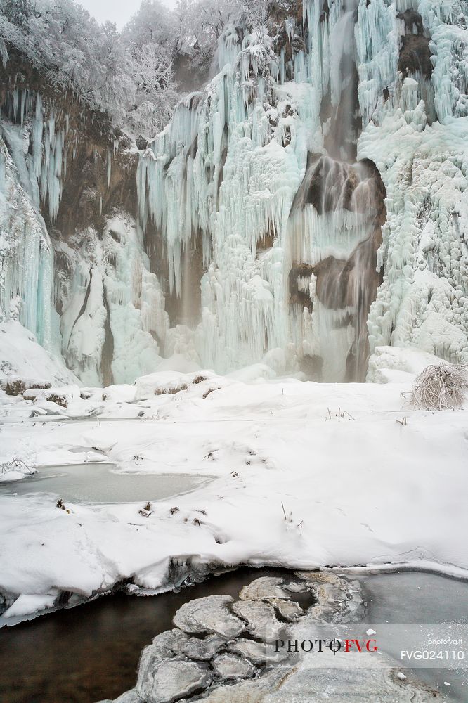 Frozen lakes and waterfalls in Plitvice Lakes National Park, Croatia