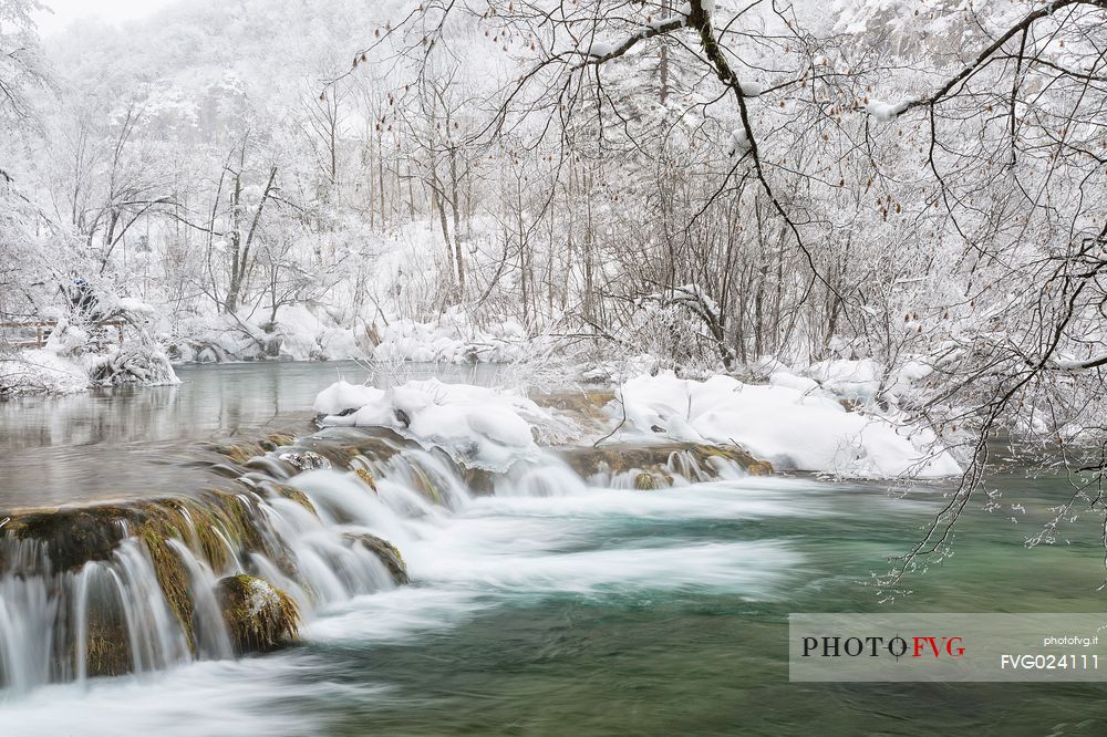 Frozen lakes and waterfalls in Plitvice Lakes National Park, Croatia