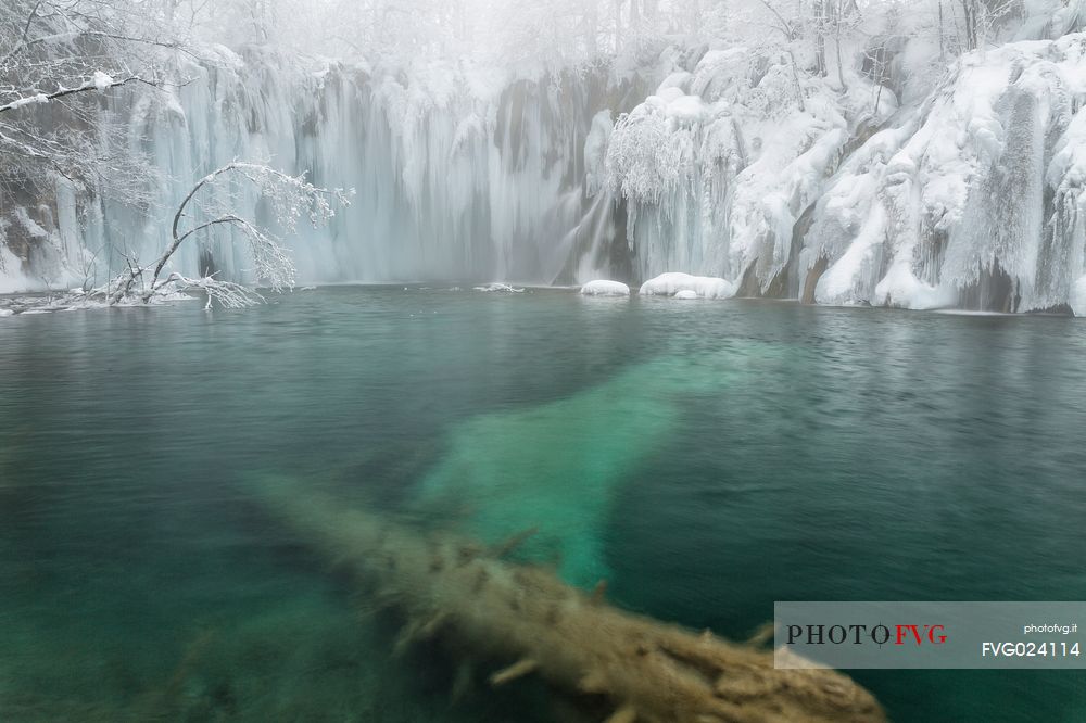 Frozen lakes and waterfalls in Plitvice Lakes National Park, Croatia