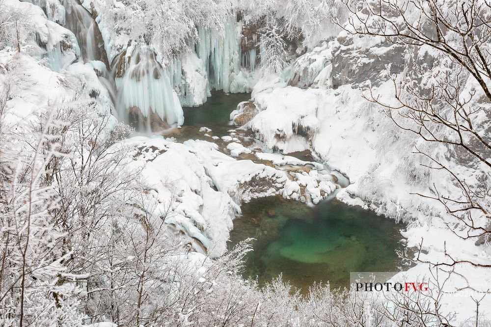 Frozen lakes and waterfalls in Plitvice Lakes National Park, Croatia