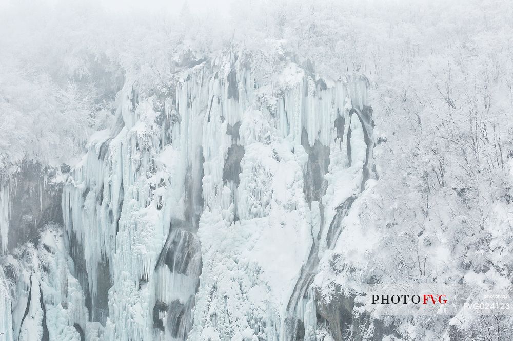 Frozen lakes and waterfalls in Plitvice Lakes National Park, Croatia