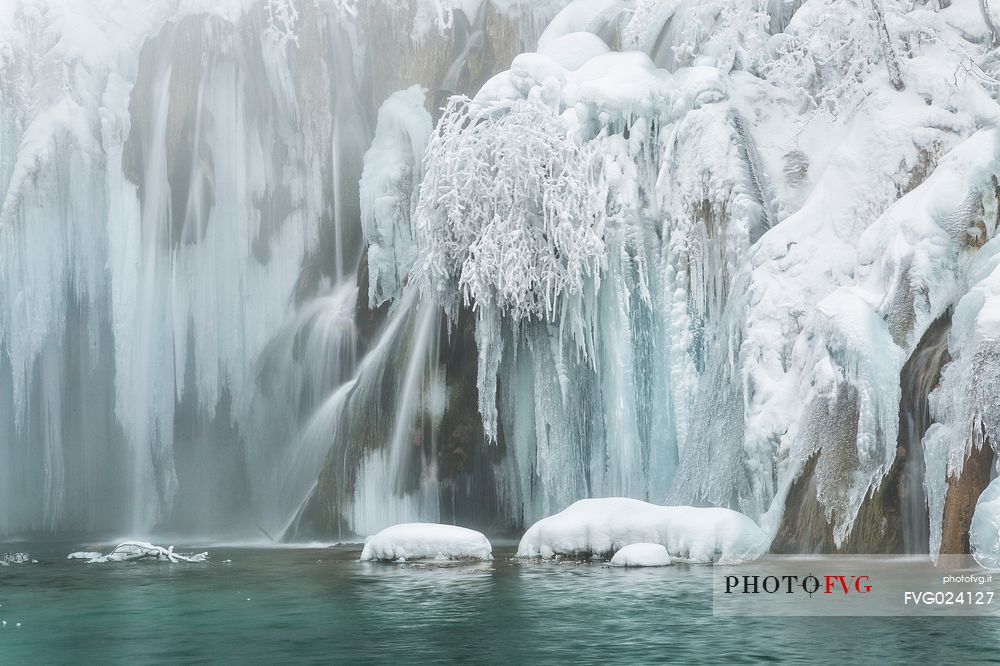 Frozen lakes and waterfalls in Plitvice Lakes National Park, Croatia