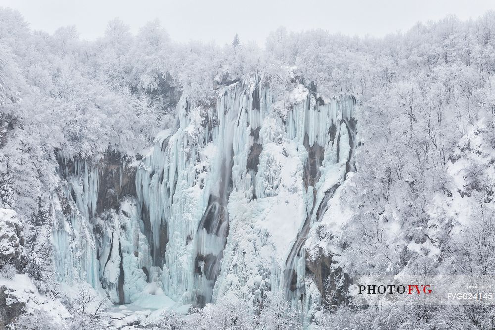 Frozen lakes and waterfalls in Plitvice Lakes National Park, Croatia