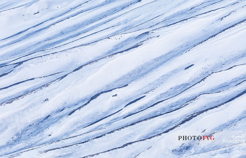 Detail of  the snowy slopes of mount Etna, Sicily, italy